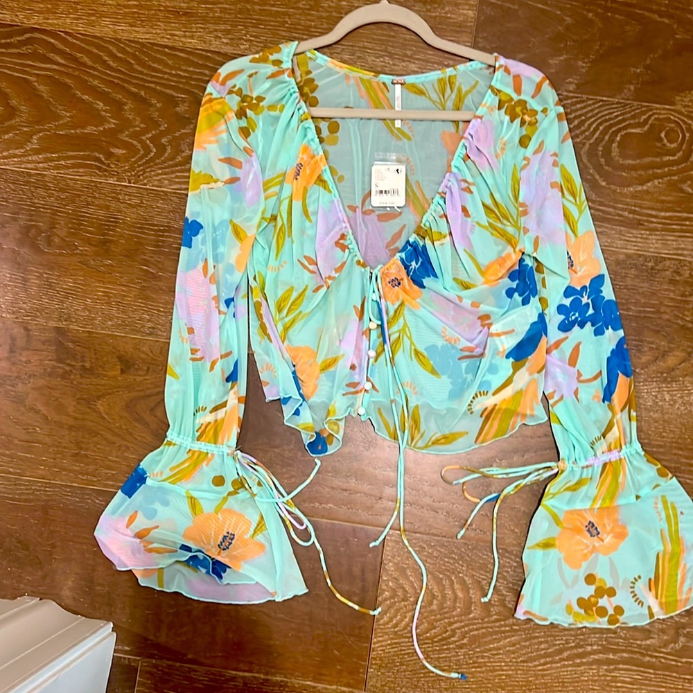 Free People.  Size small.  Brand new with tags.  Never worn.